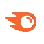 Orange logo of Semrush on a clean white background, indicative of a digital marketing agency